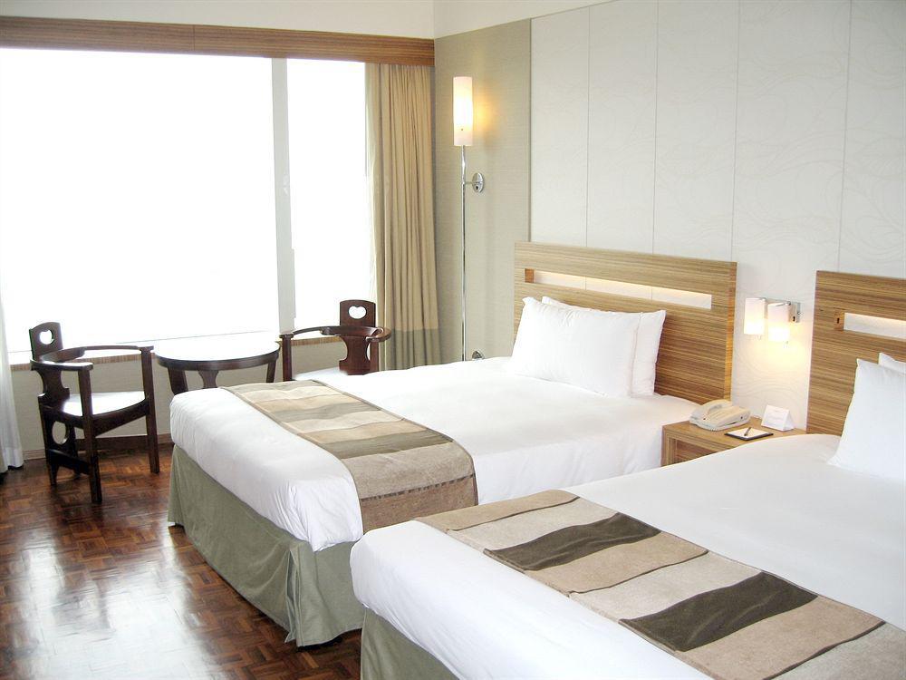 Nina Hotel Tsuen Wan West Hongkong Eksteriør billede A room at the hotel